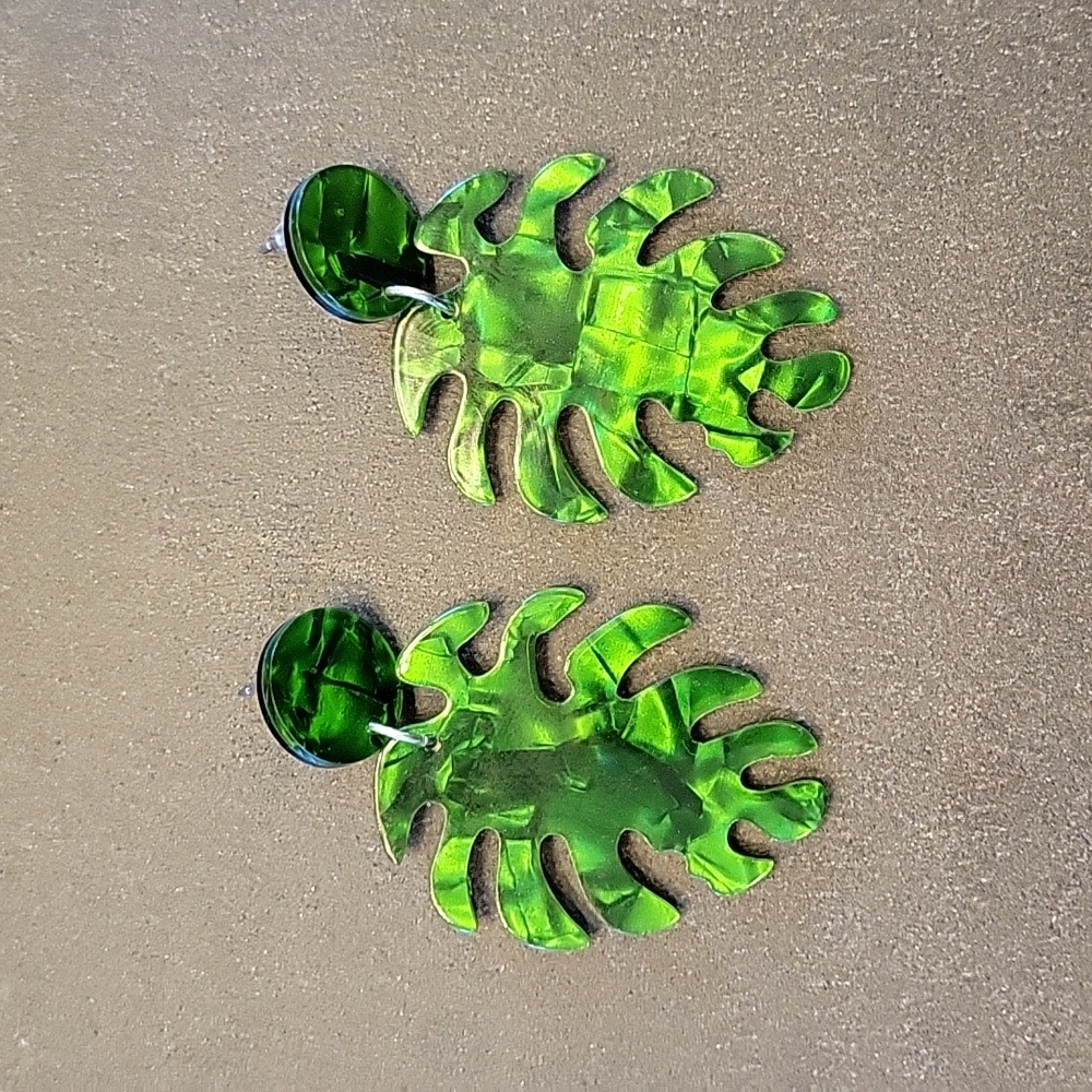 Zenzii green lucite earrings in palm leaf shape